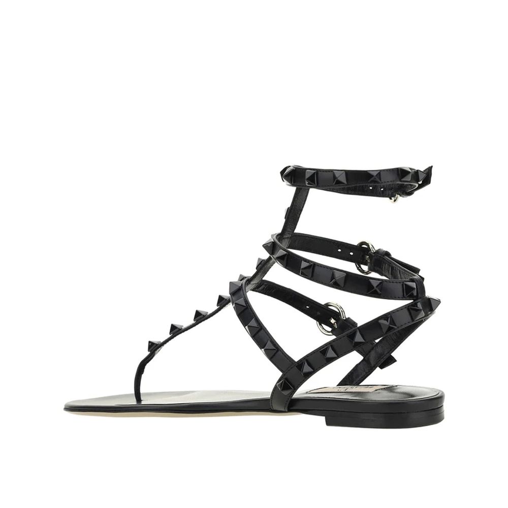 Valentino Garavani Black Calfskin Flat Sandals | Regal Royce