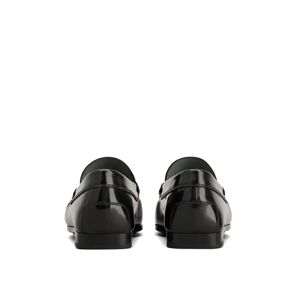 Tod's Black Calfskin Slip-On Loafers | Regal Royce