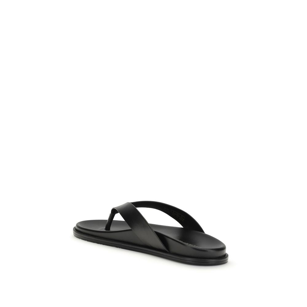 Stuart Weitzman Black Calf Leather Bos Taurus Flip-Flop Sandals | Regal Royce