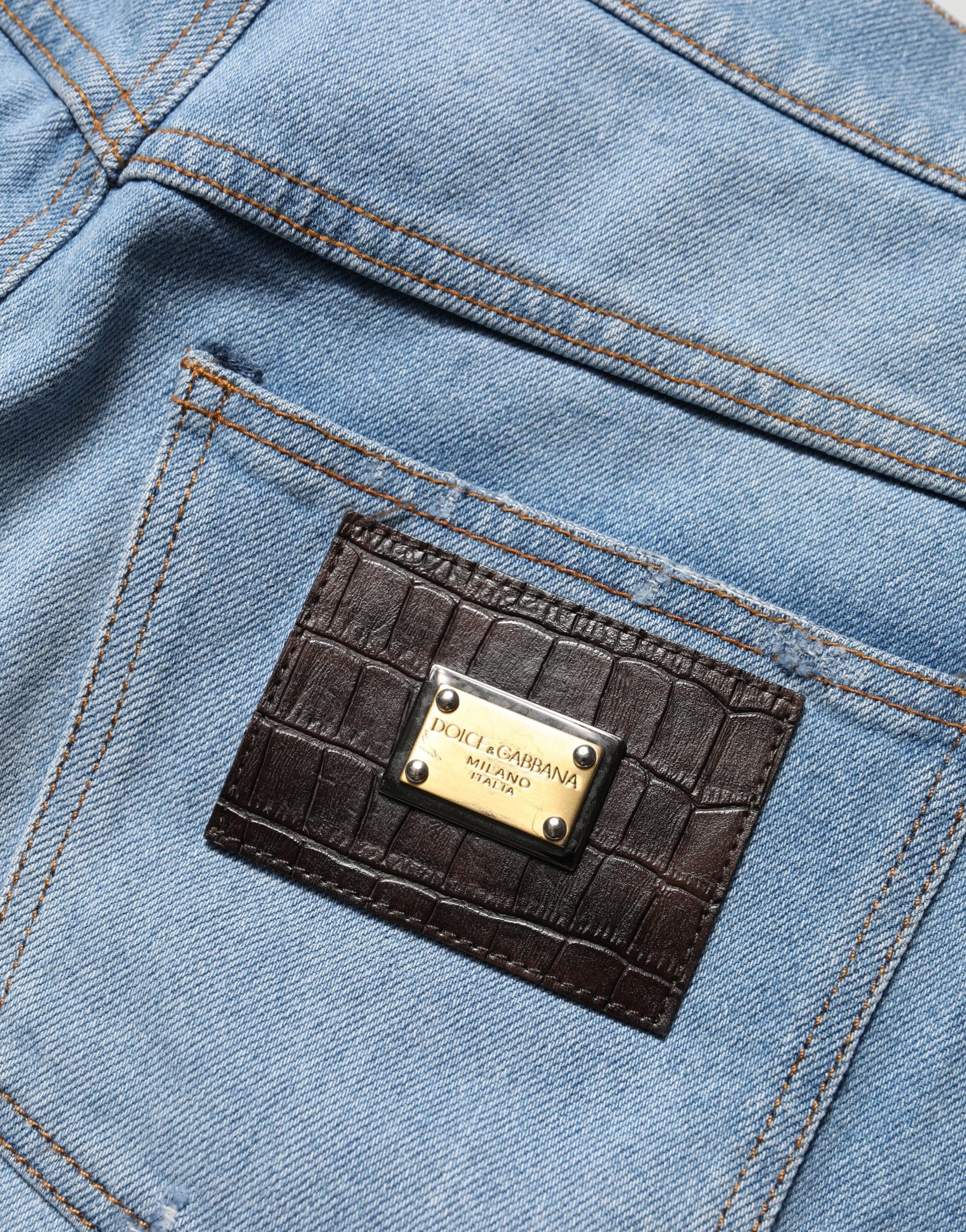 Dolce & Gabbana Blue Distressed Pleated Cotton Denim Jeans | Regal Royce