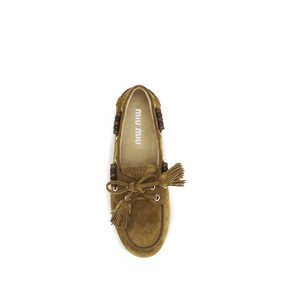 Miu Miu Beige Calf Leather Bos Taurus Slip-On Loafers | Regal Royce