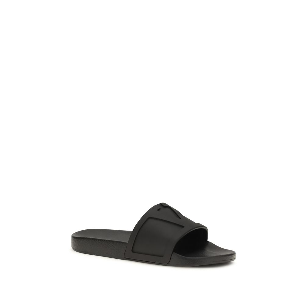 Valentino Garavani Black Rubber Flat Sandals | Regal Royce
