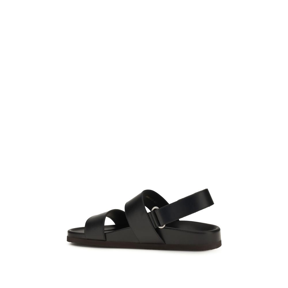 Valentino Garavani Black Calf Leather Bos Taurus Flat Sandals | Regal Royce