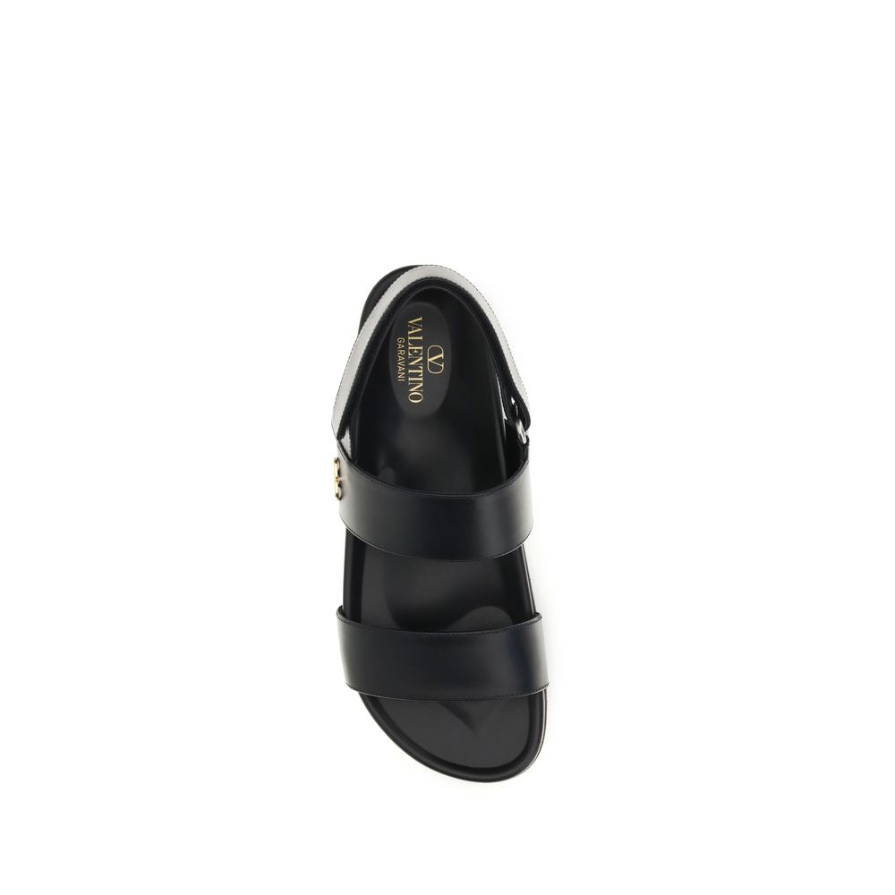 Valentino Garavani Black Calf Leather Bos Taurus Flat Sandals | Regal Royce