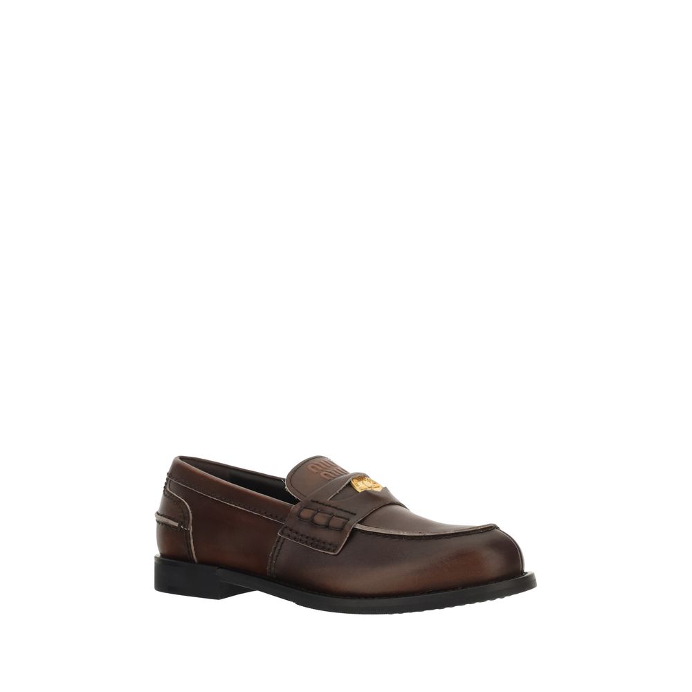 Miu Miu Brown Calf Leather Bos Taurus Slip-On Loafers | Regal Royce