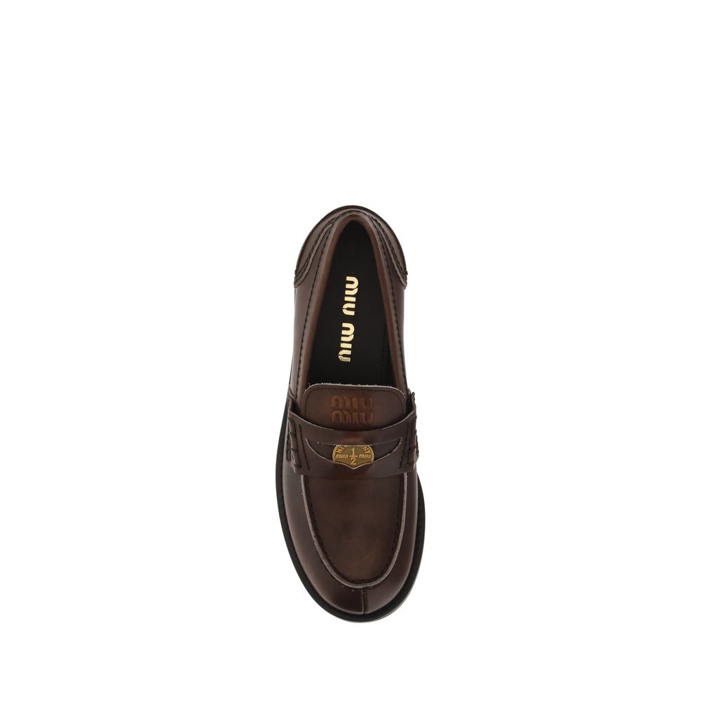 Miu Miu Brown Calf Leather Bos Taurus Slip-On Loafers | Regal Royce