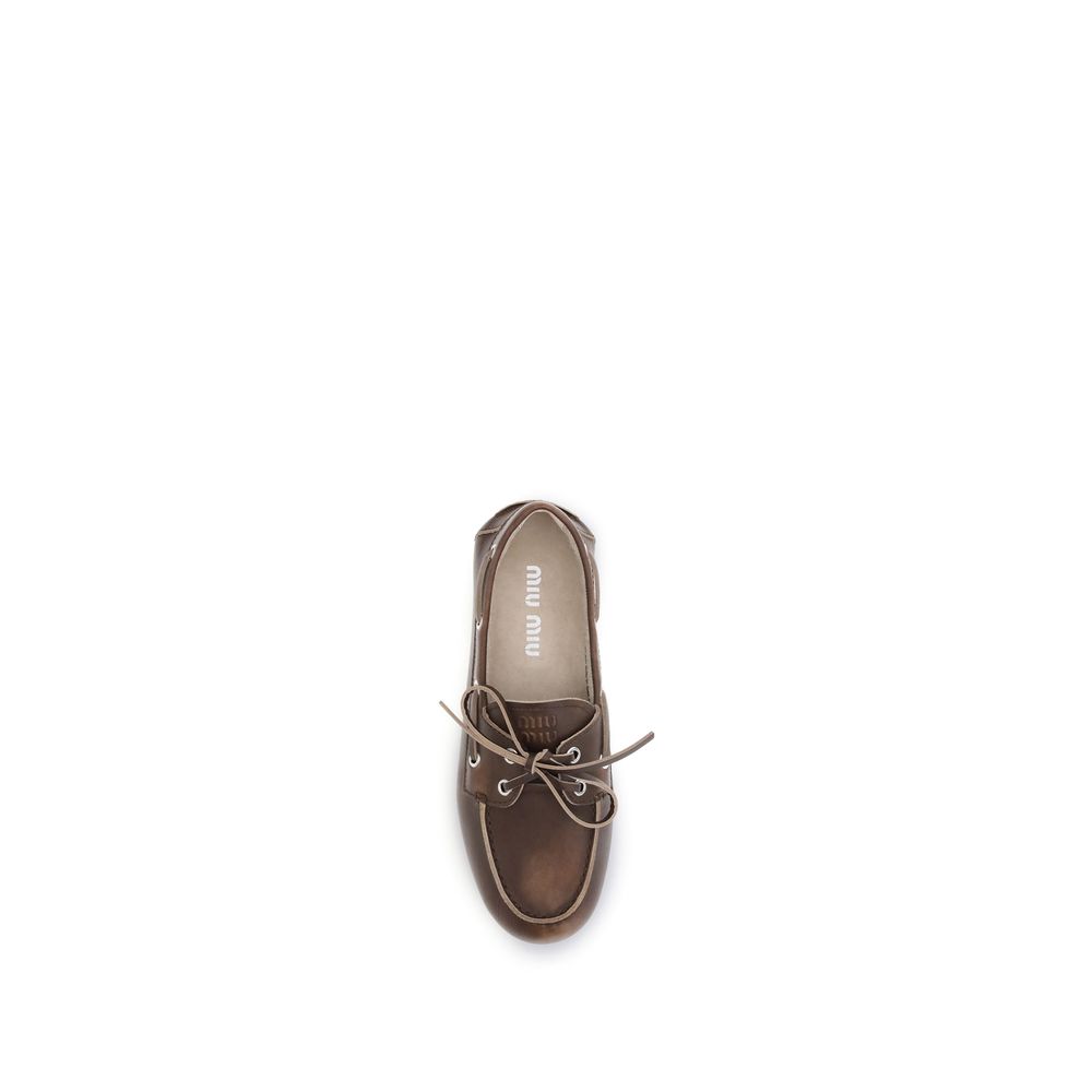 Miu Miu Brown Calf Leather Bos Taurus Slip-On Loafers | Regal Royce