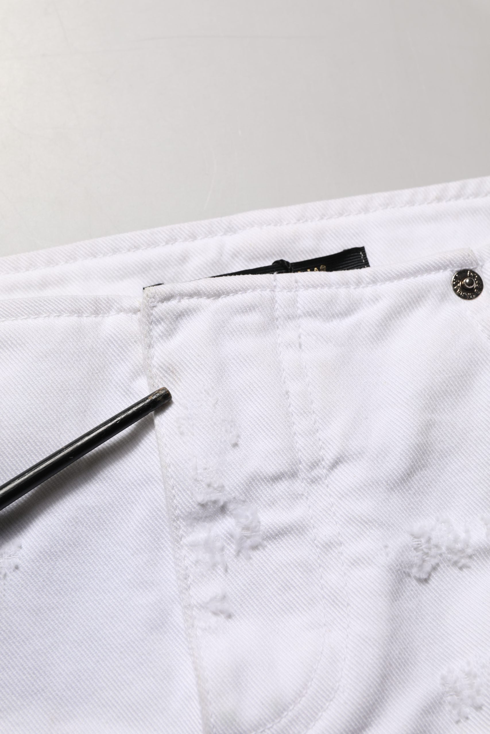 Dolce & Gabbana White Distressed Cotton Denim Mini Skirt | Regal Royce