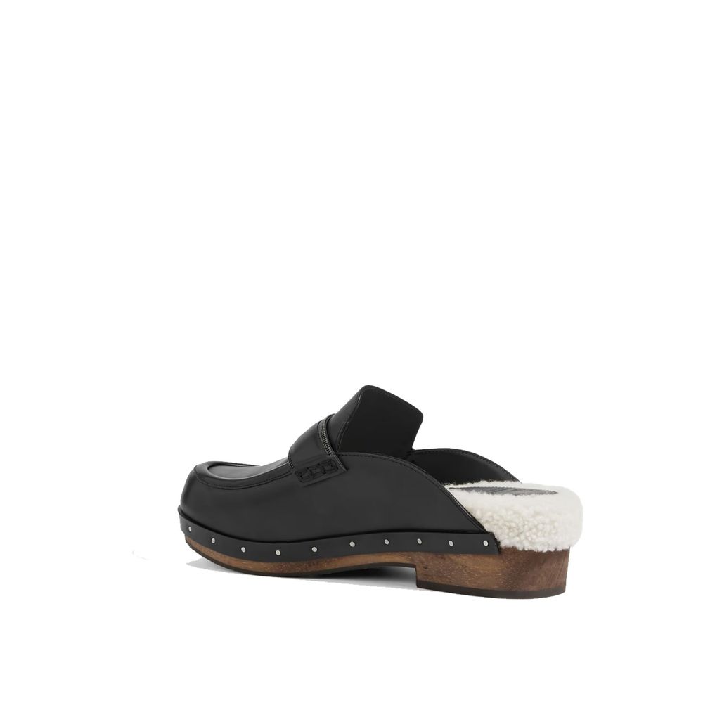 Brunello Cucinelli Black Leather Mules | Regal Royce