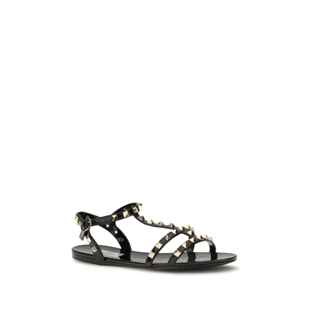 Valentino Garavani Black Rubber Flat Sandals | Regal Royce