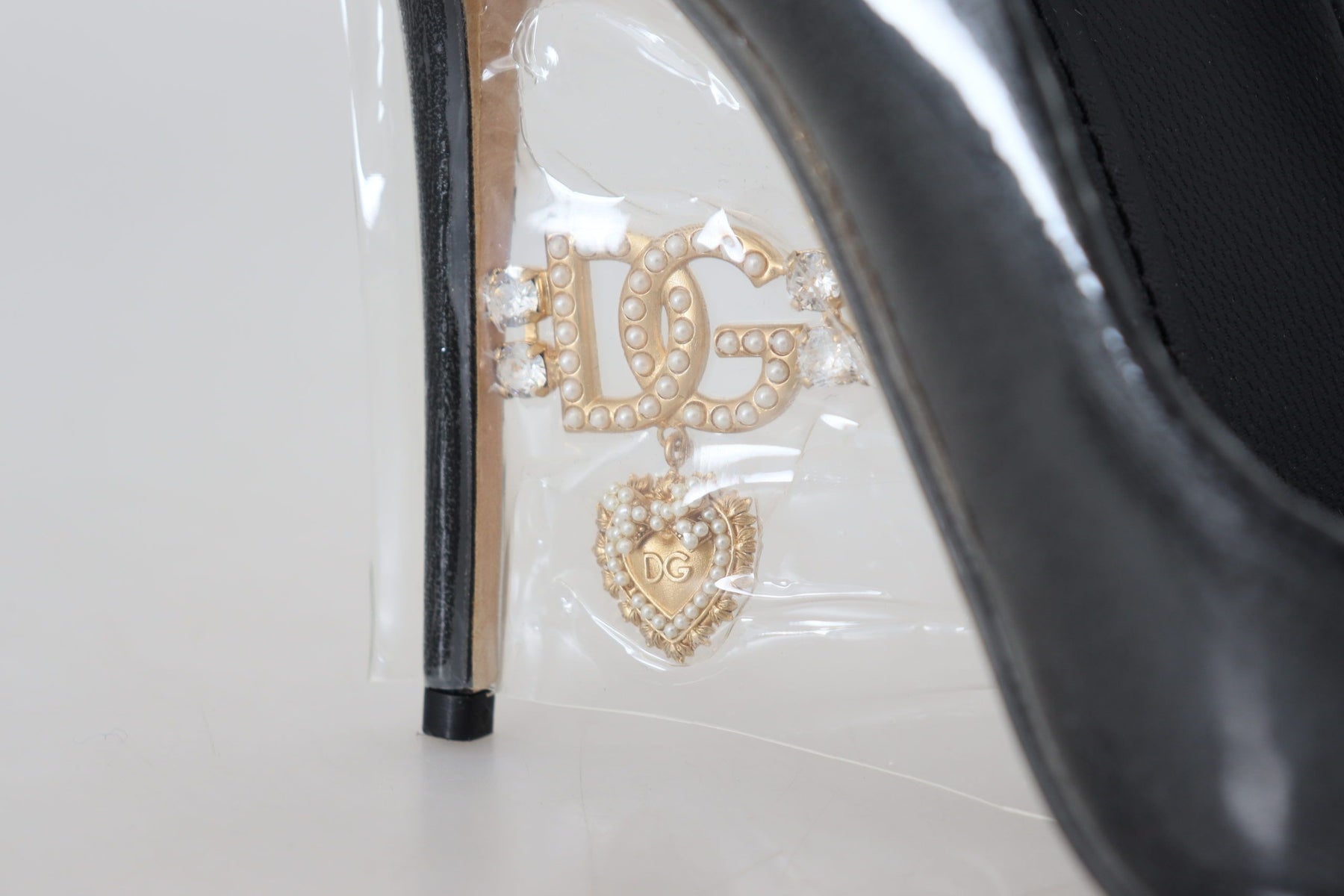 Dolce & Gabbana Black Leather Heels Pumps Plastic Wrapped Shoes | Regal Royce