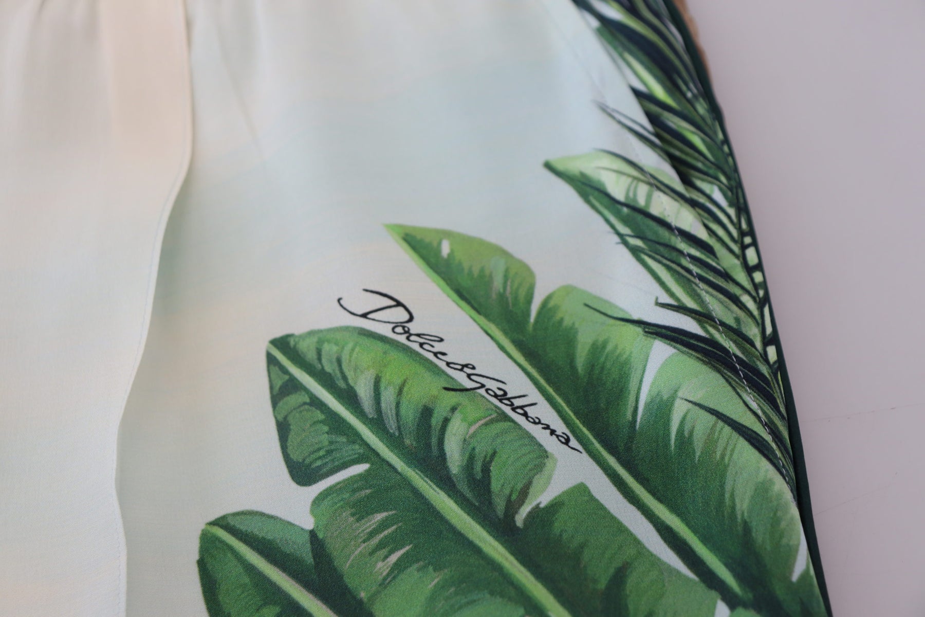 Dolce & Gabbana White Floral Printed Men Jogger Pants | Regal Royce