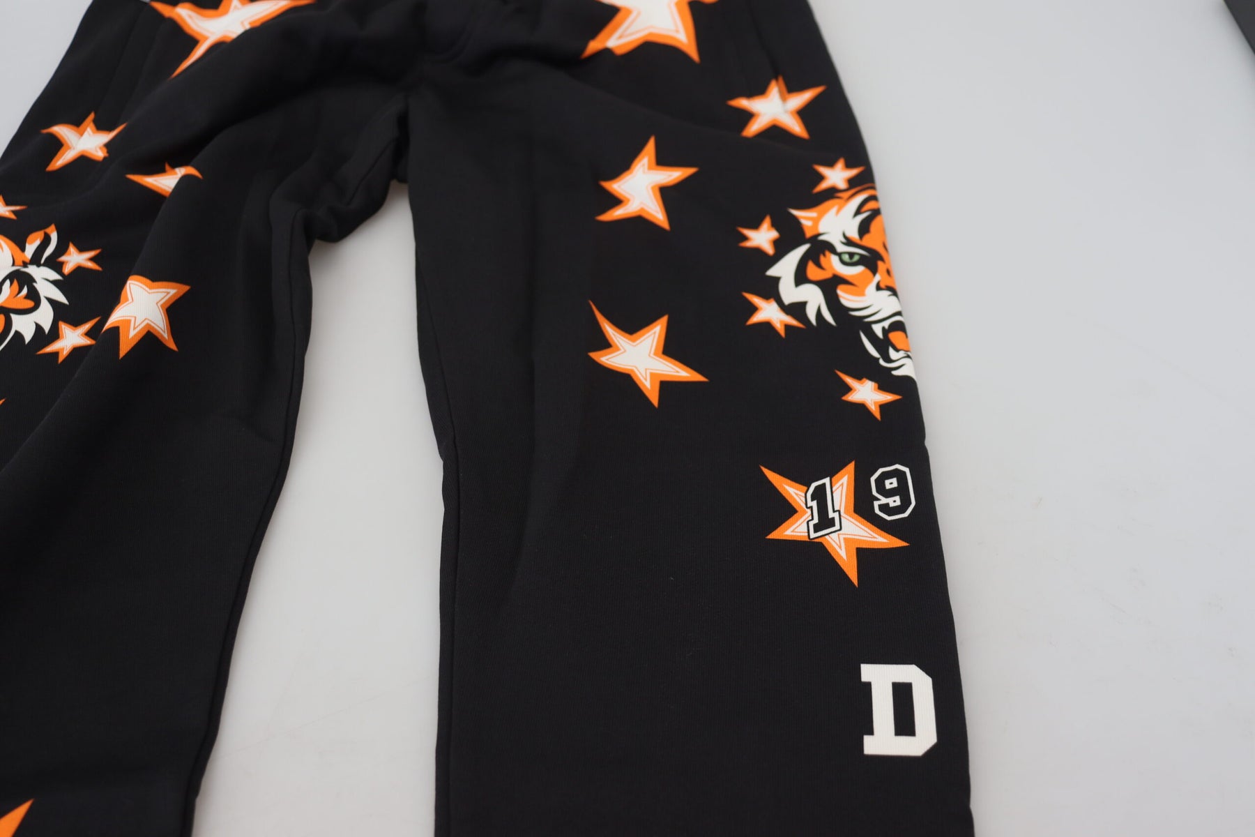 Dolce & Gabbana Black Orange Star Trousers Sport Pants | Regal Royce