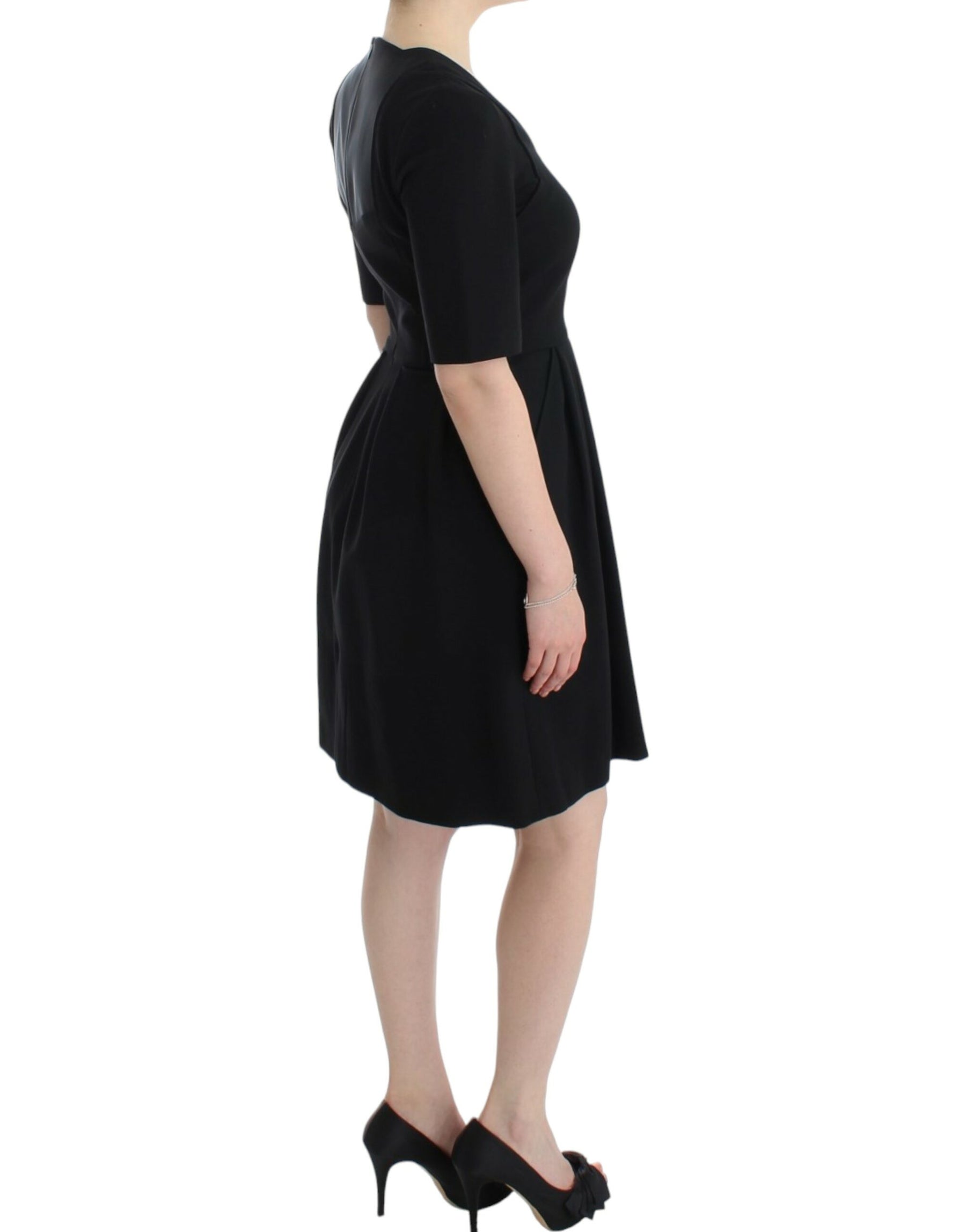 CO|TE Black short sleeve venus dress | Regal Royce