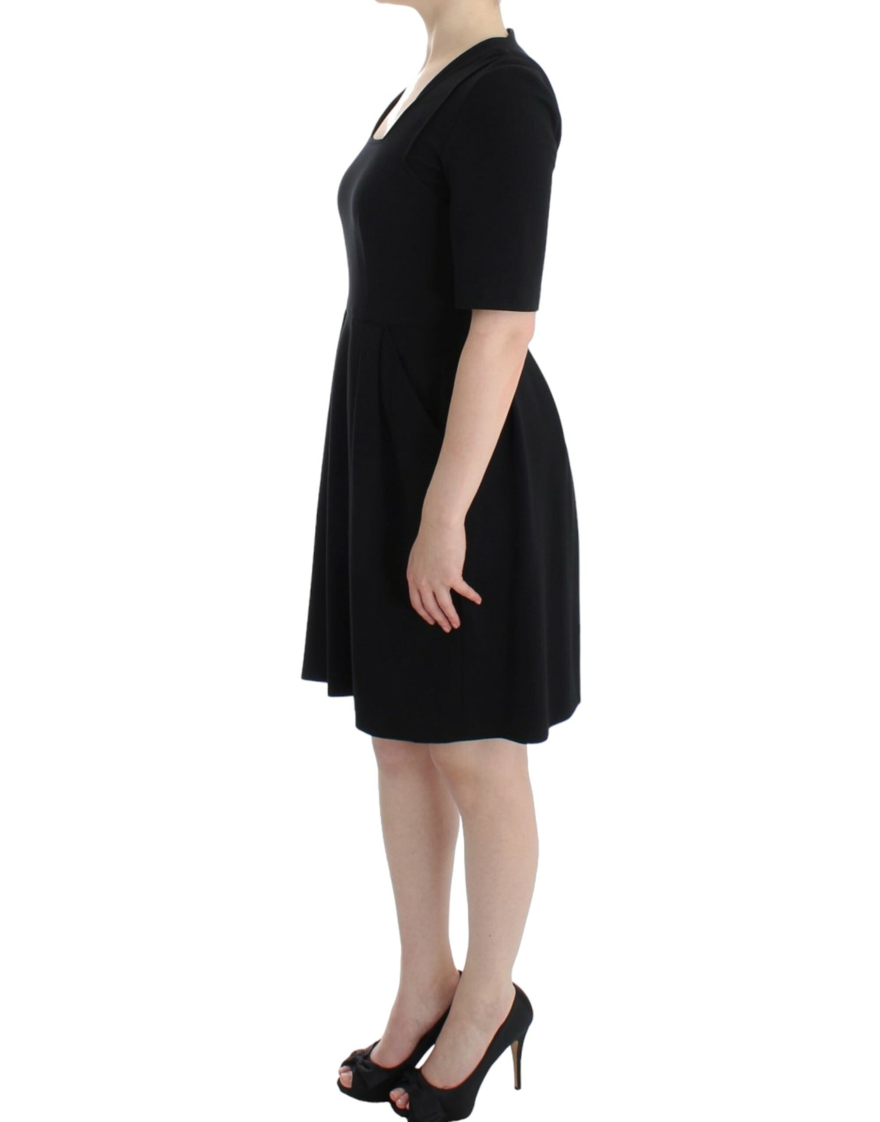 CO|TE Black short sleeve venus dress | Regal Royce