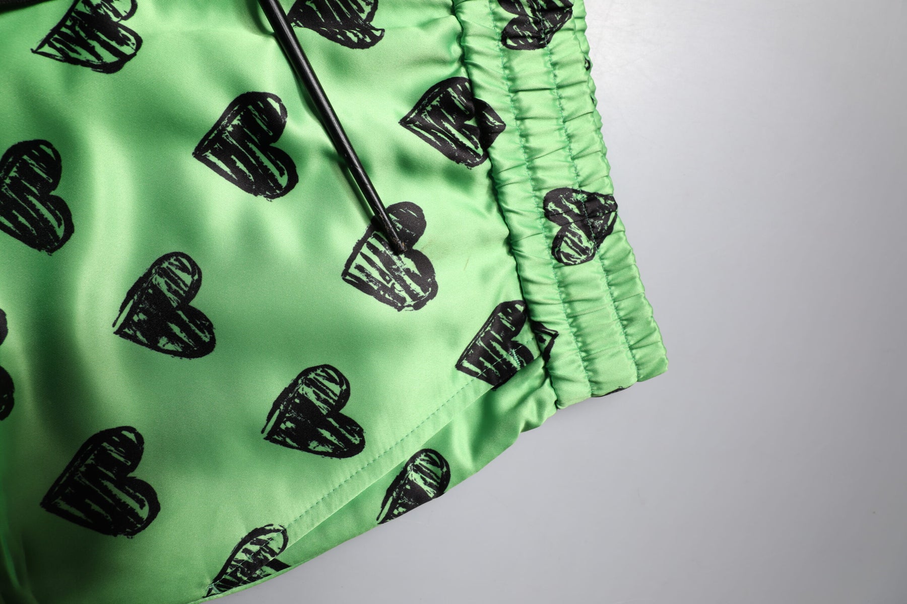 Dolce & Gabbana Green Heart Print Cargo Men Bermuda Shorts | Regal Royce
