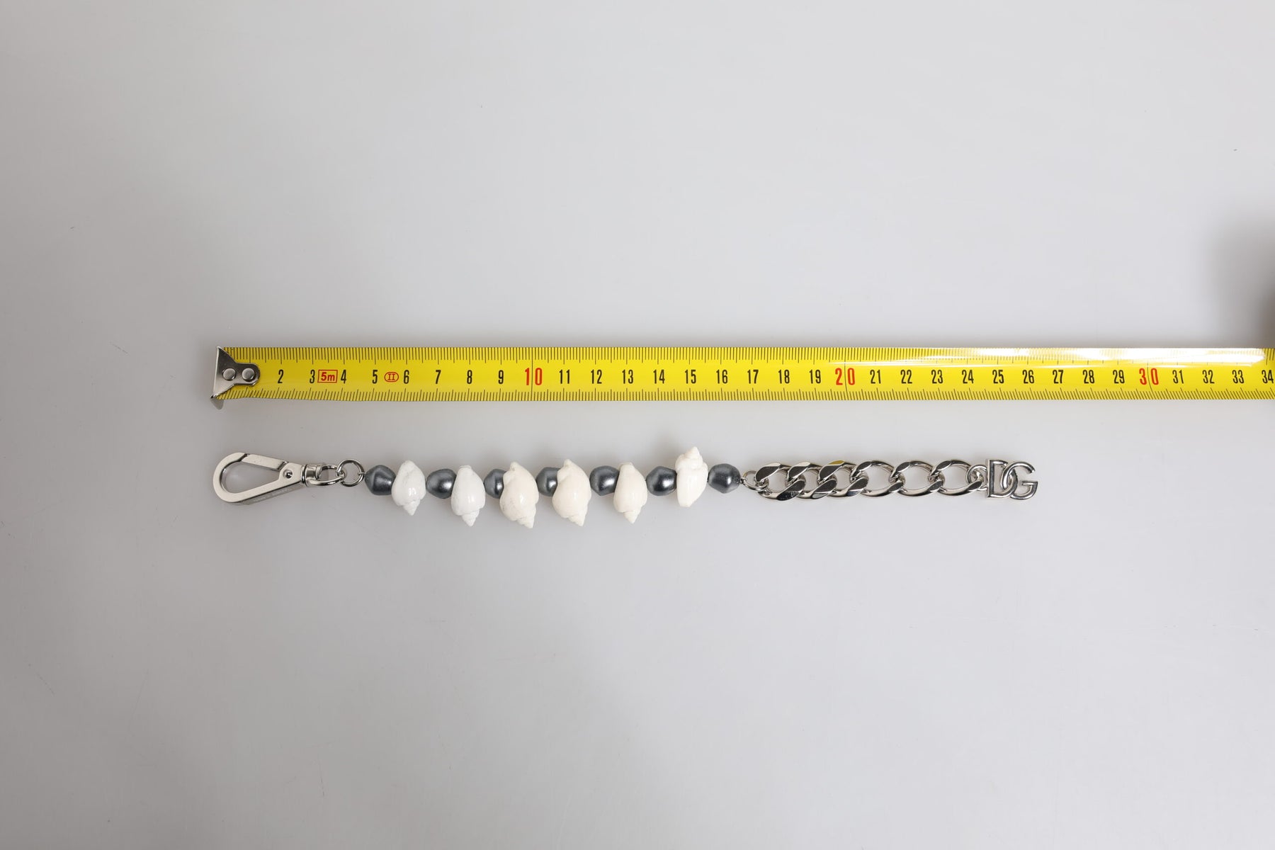 Dolce & Gabbana Silver Tone Brass Beaded Shell DG Logo Pendant Bracelet | Regal Royce