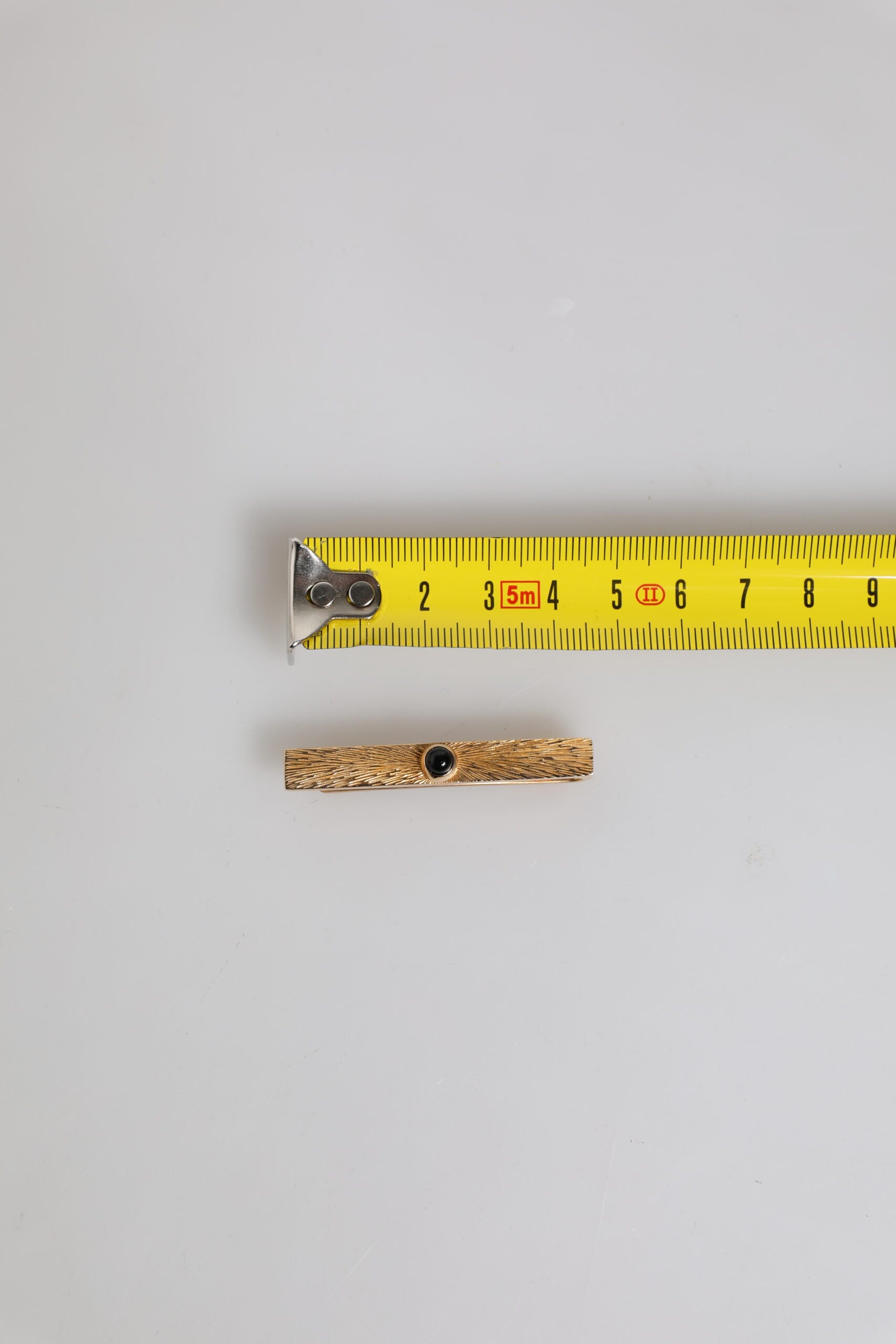 Dolce & Gabbana Black Sapphire Gold Tone Brass Tie Clip Bar | Regal Royce