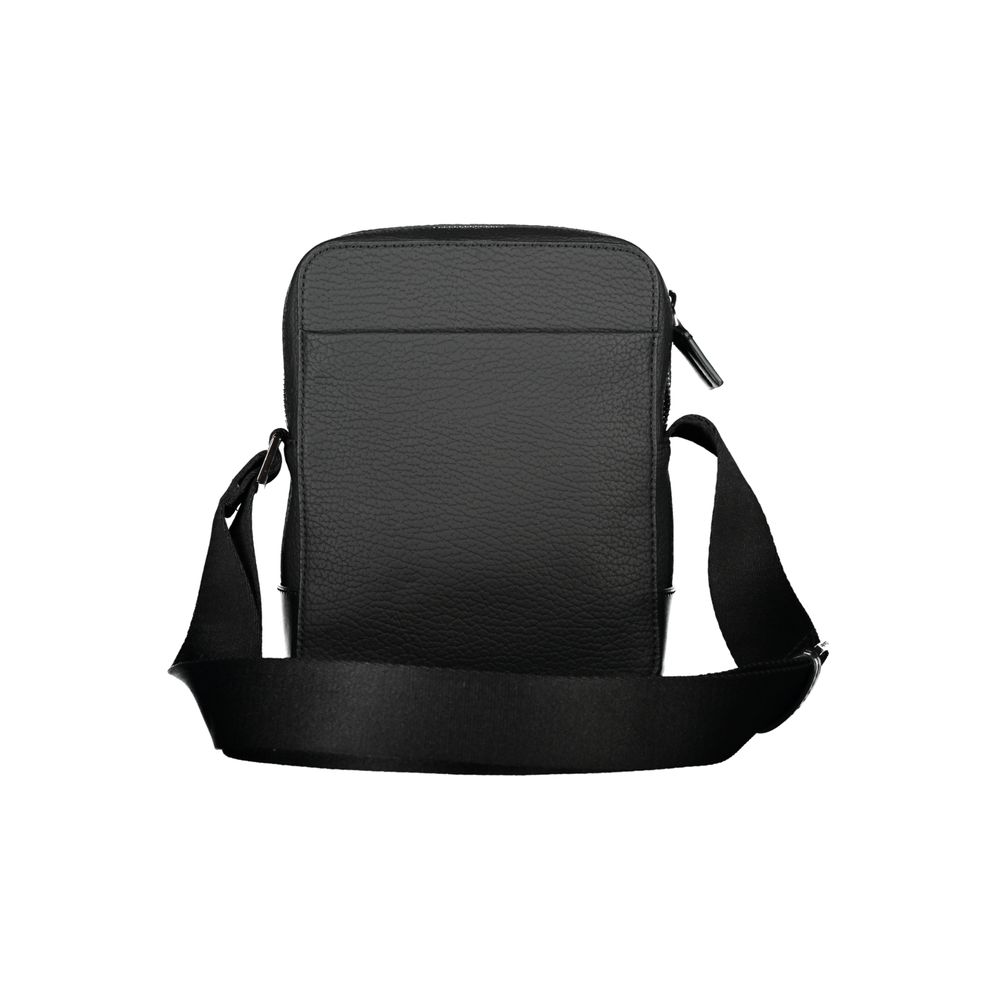 Calvin Klein Sleek Black Shoulder Bag with Contrasting Details | Regal Royce