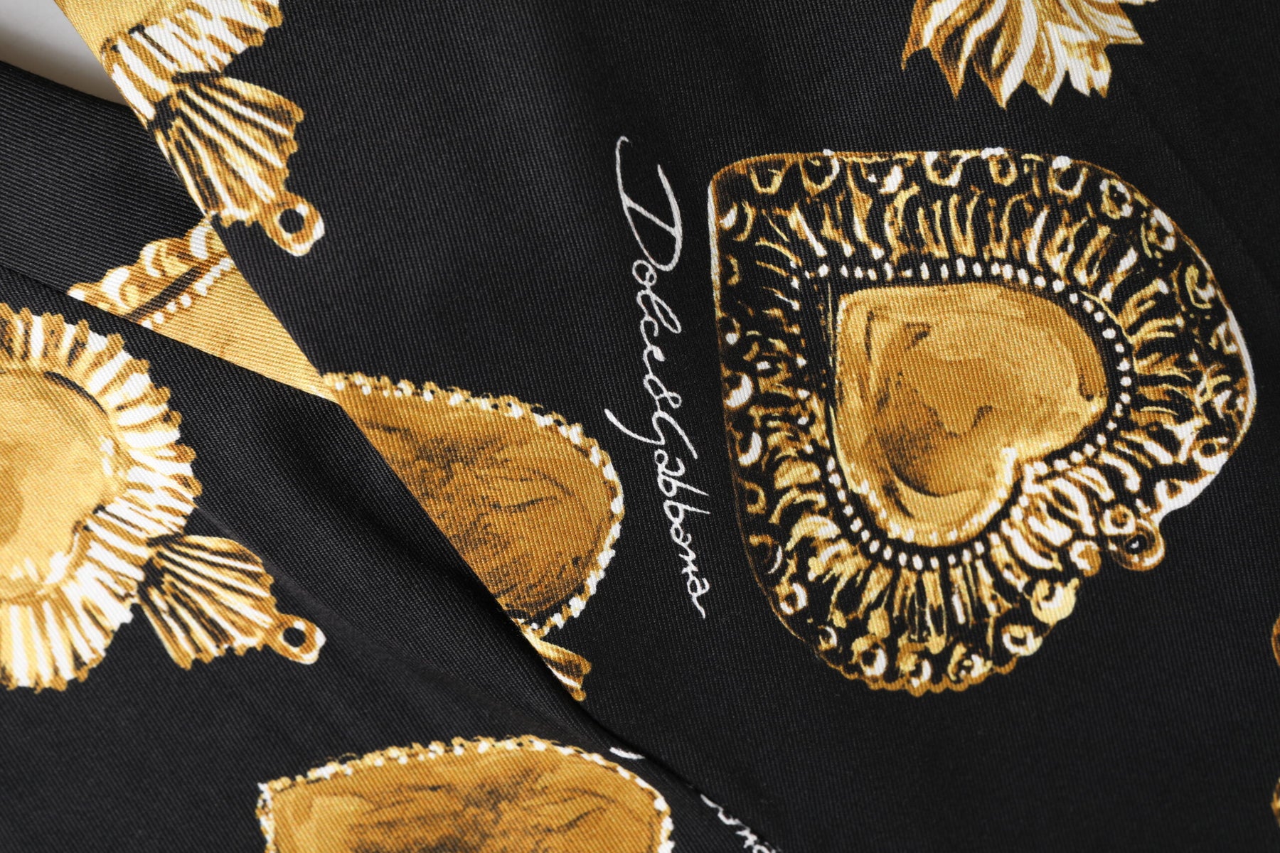 Dolce & Gabbana Black Gold Sacred Heart Print Pants | Regal Royce