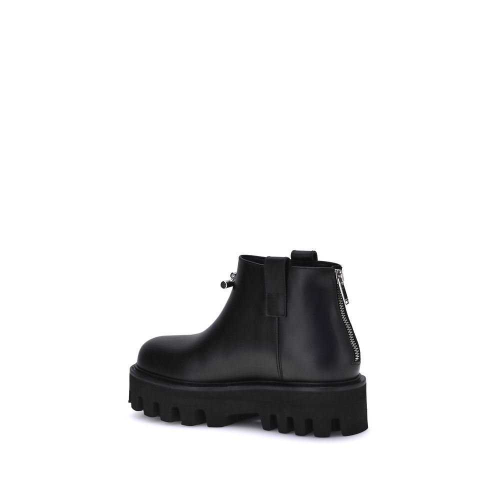 Alexander McQueen Black Calf Leather Bos Taurus Ankle Boots | Regal Royce
