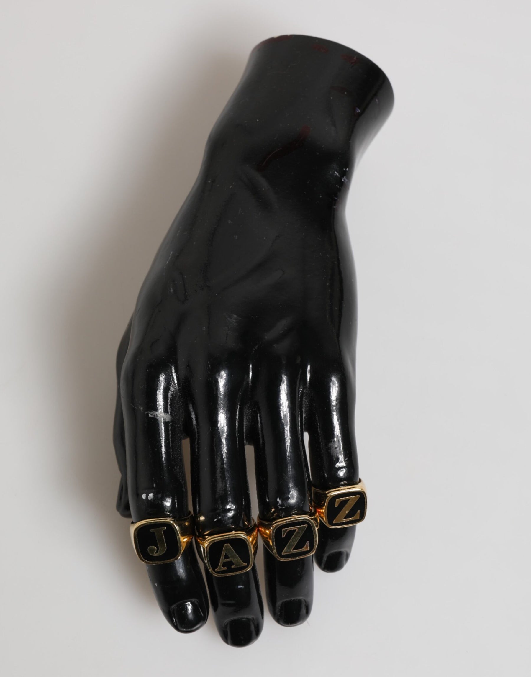 Dolce & Gabbana Gold Tone Brass JAZZ Letter Set 4 Pieces Adjustable Ring | Regal Royce