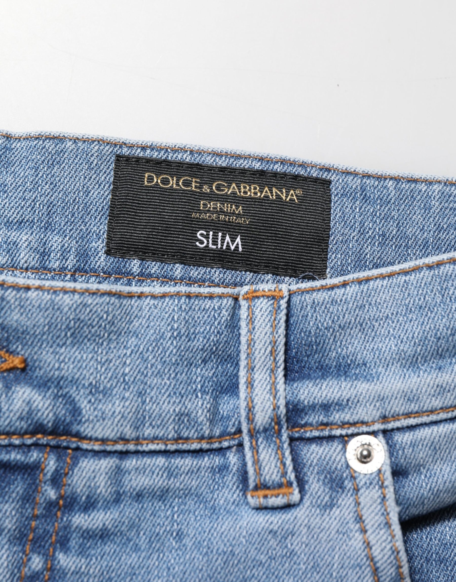 Dolce & Gabbana Blue Tattered Slim Fit Cotton Denim Jeans | Regal Royce
