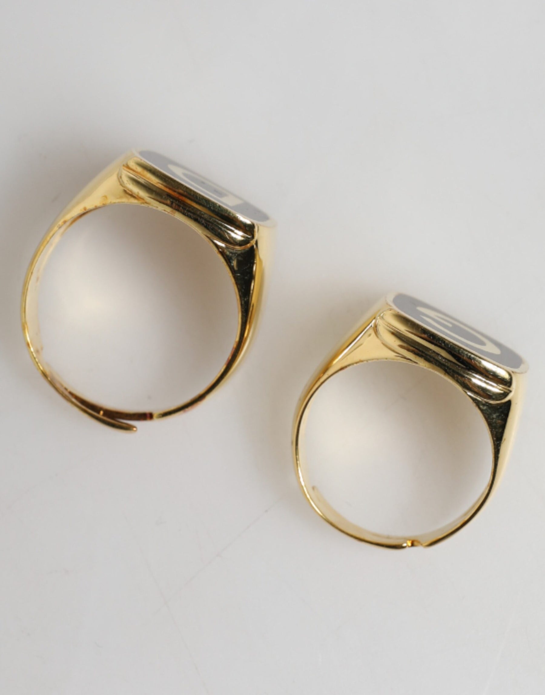 Dolce & Gabbana Gold-Tone Real Brass Black Enamel "DG" Adjustable Rings | Regal Royce