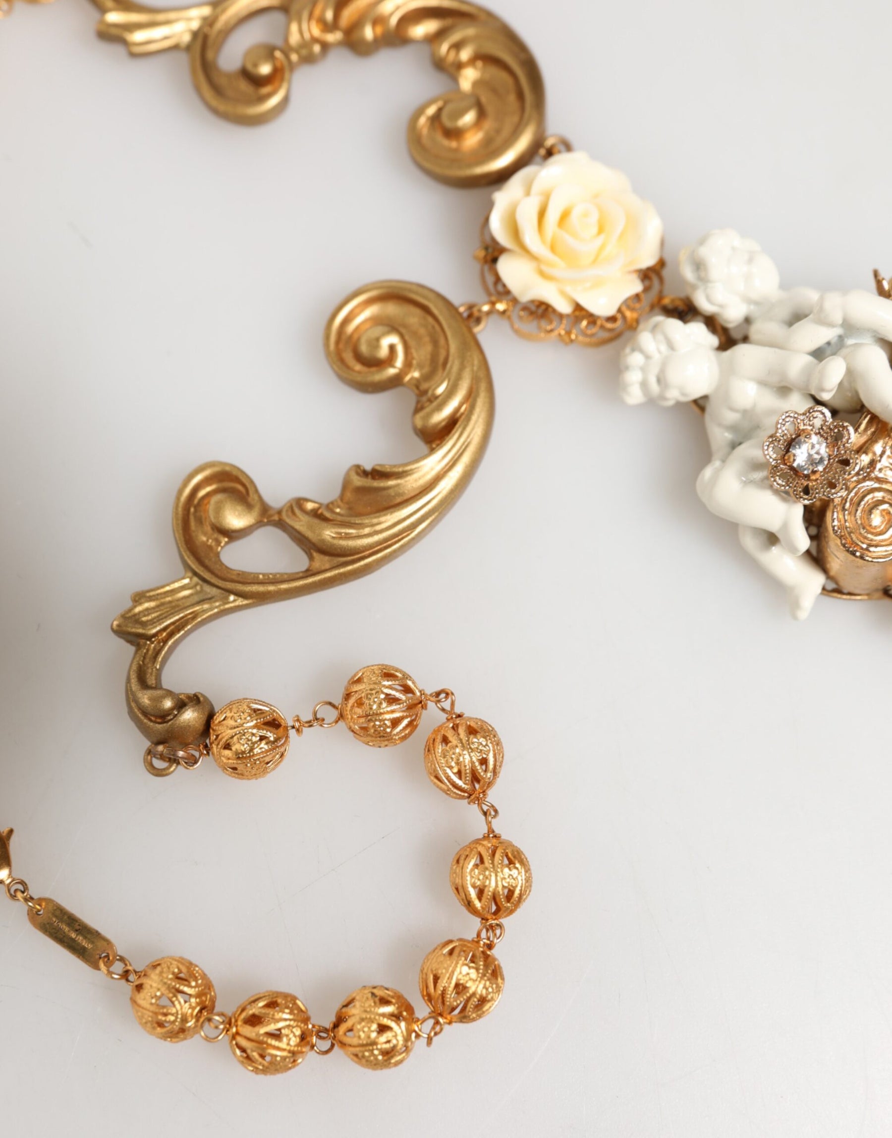 Dolce & Gabbana Gold Ceramic Crystal Cherub Baroque Pendant Necklace | Regal Royce