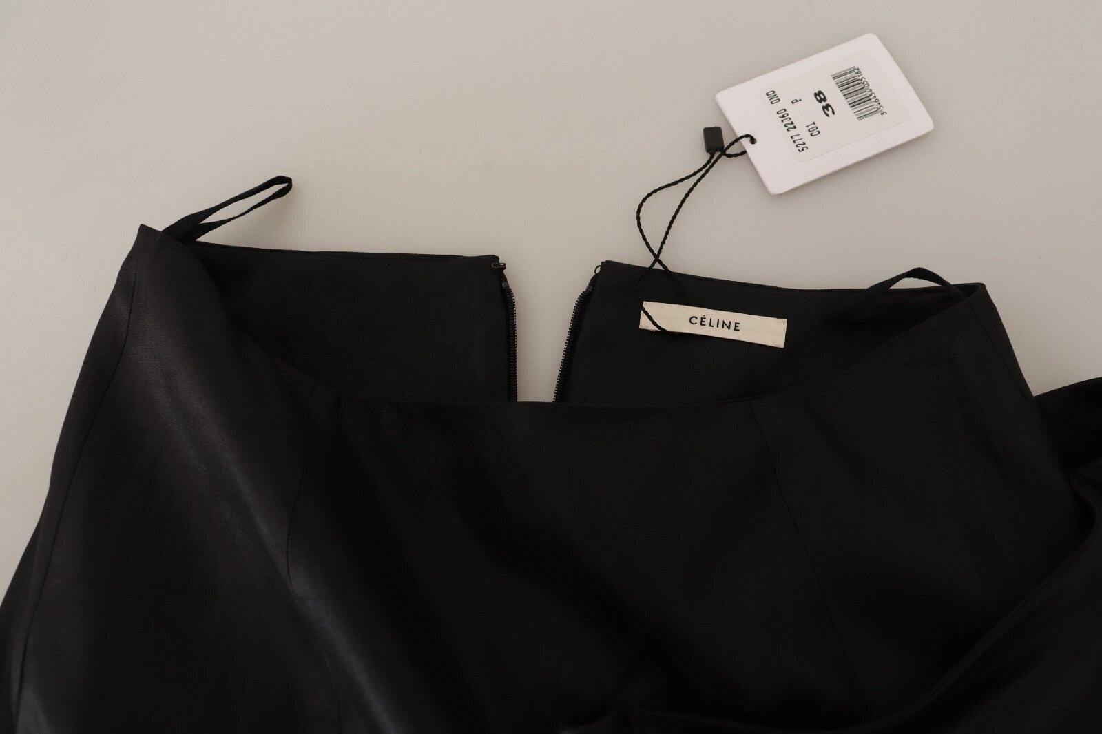 Celine Acetate Black High Waist Wrap Style Asymmetric Skirt | Regal Royce